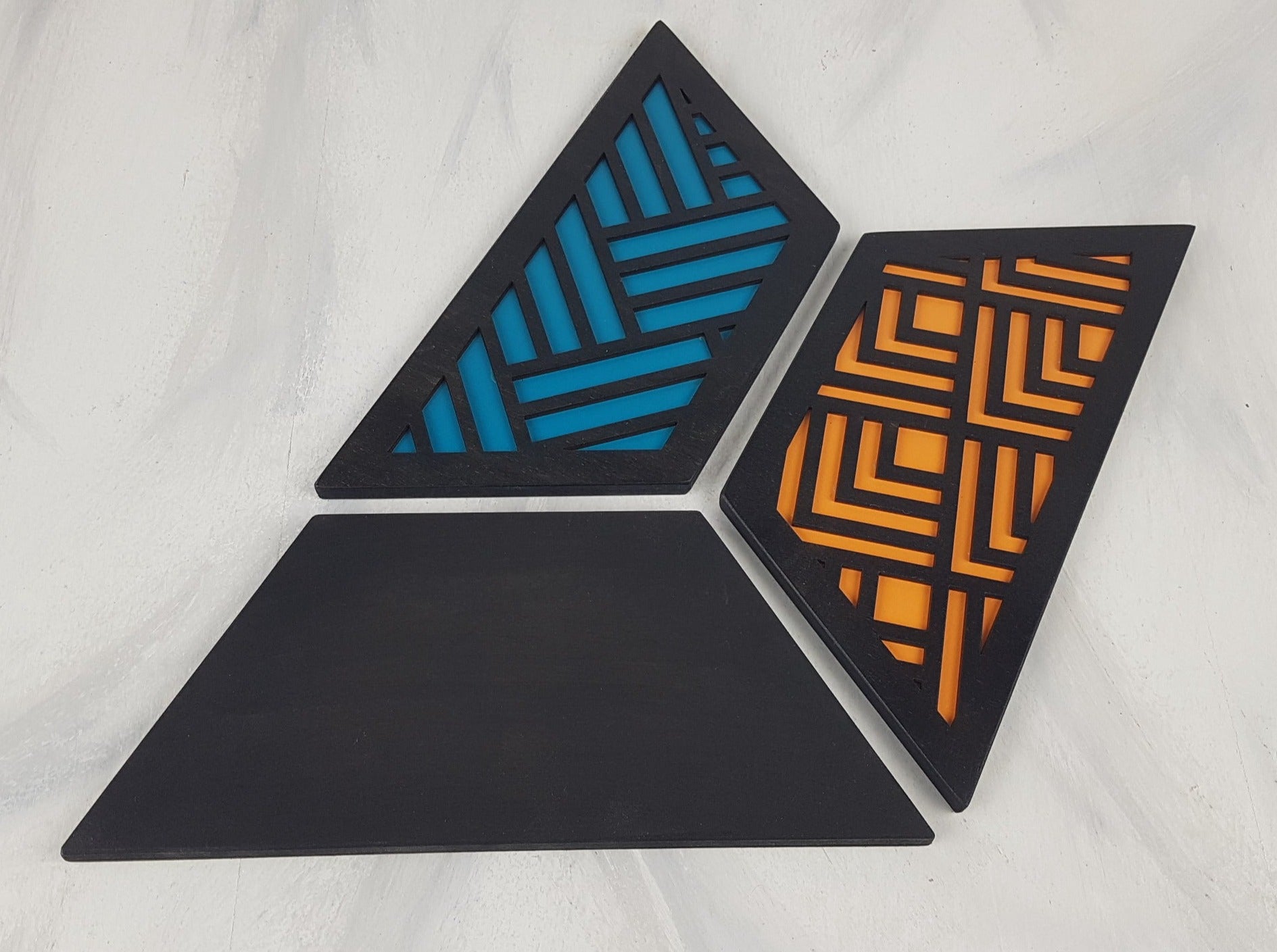 Showing the back of the trivets