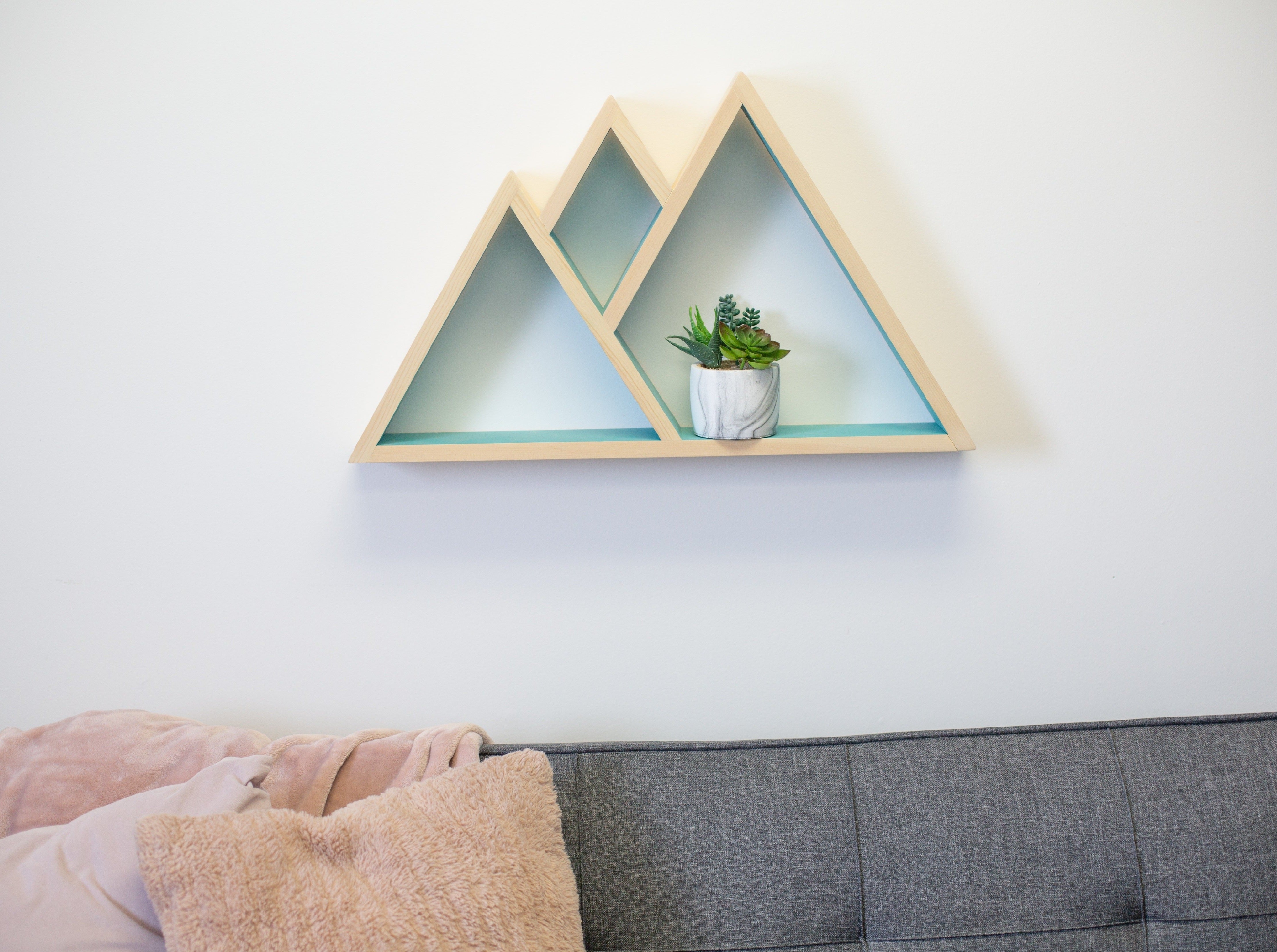 Mountain shelf above sofa